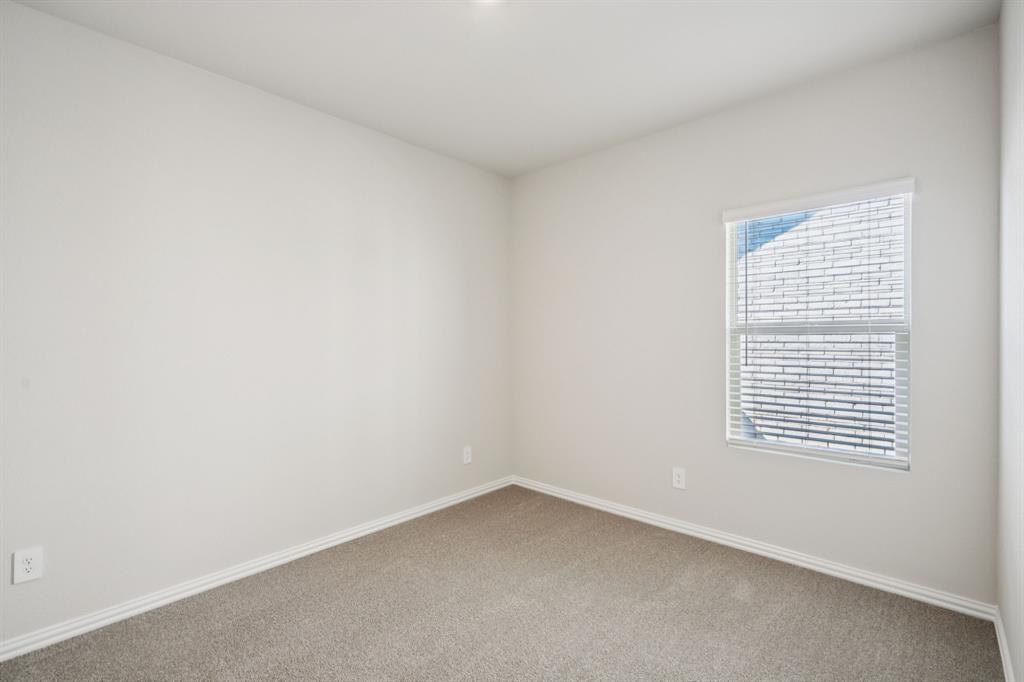 1632 Arches Road Anna, TX 75409 - Photo 23 of 29 a view of an empty room with a window