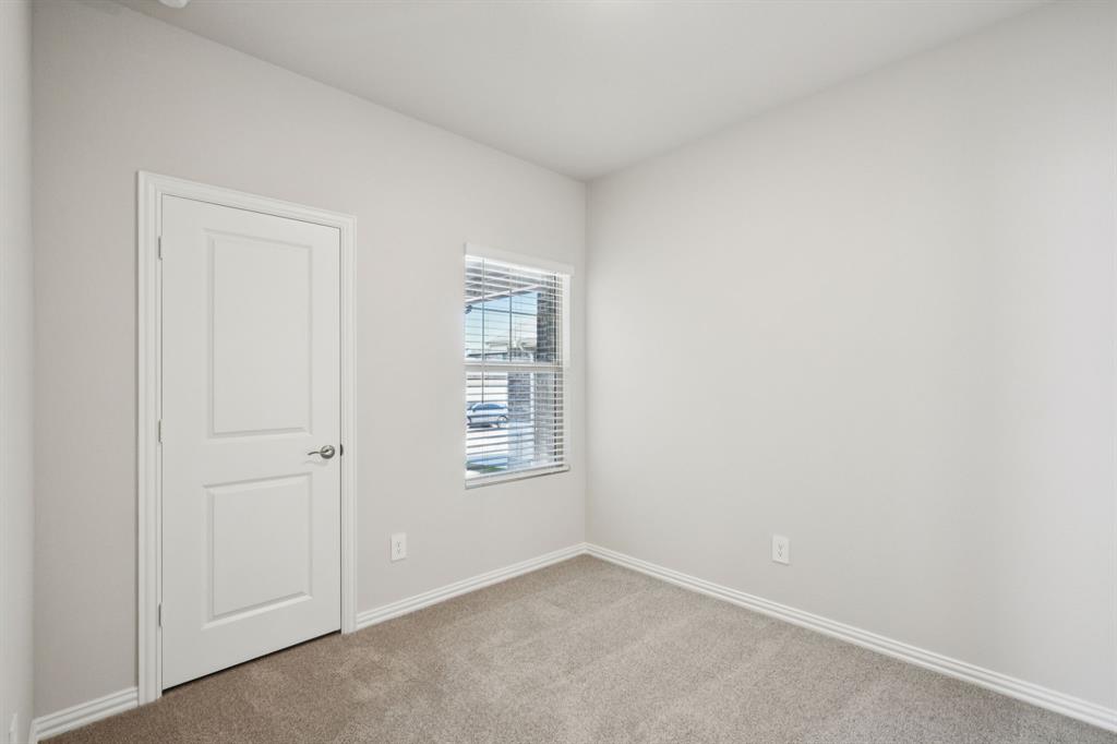 1632 Arches Road Anna, TX 75409 - Photo 25 of 29 an empty room with windows