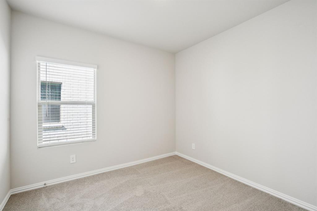 1632 Arches Road Anna, TX 75409 - Photo 27 of 29 an empty room with a window