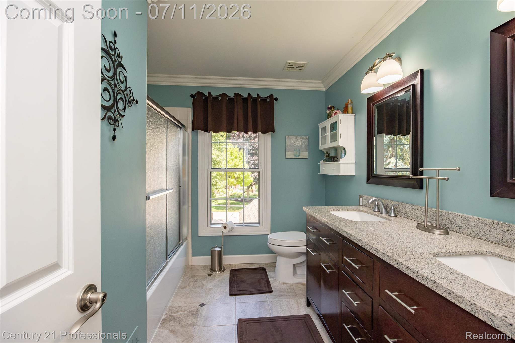 689 Woodfield Way Rochester, MI 48307 - Photo 26 of 61 Bathroom featuring a dual vanity with granite-style countertops, wood-finish cabinetry, and two undermount sinks
