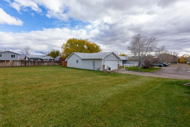 a view of a house with a big yard