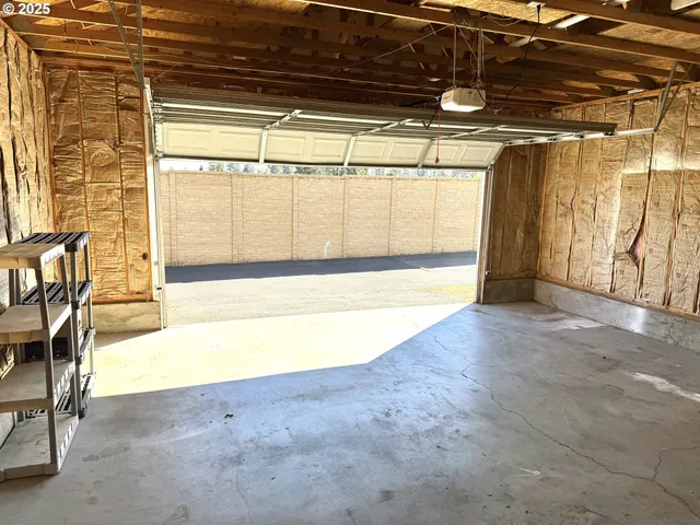 a view of a backyard of the house