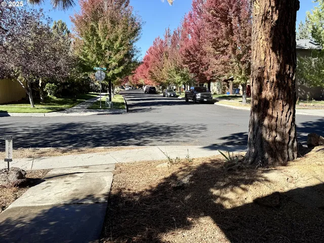 a view of swimming pool with a yard and sitting space