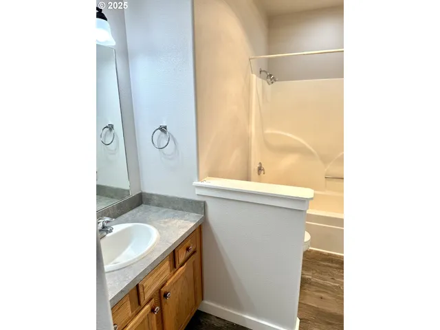 a view of a room with a sink and a window