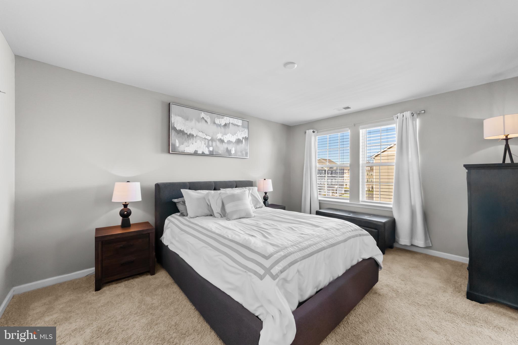 51 Turin Way Mount Laurel, NJ 08054 - Photo 18 of 35 a bedroom with a bed and wooden floor