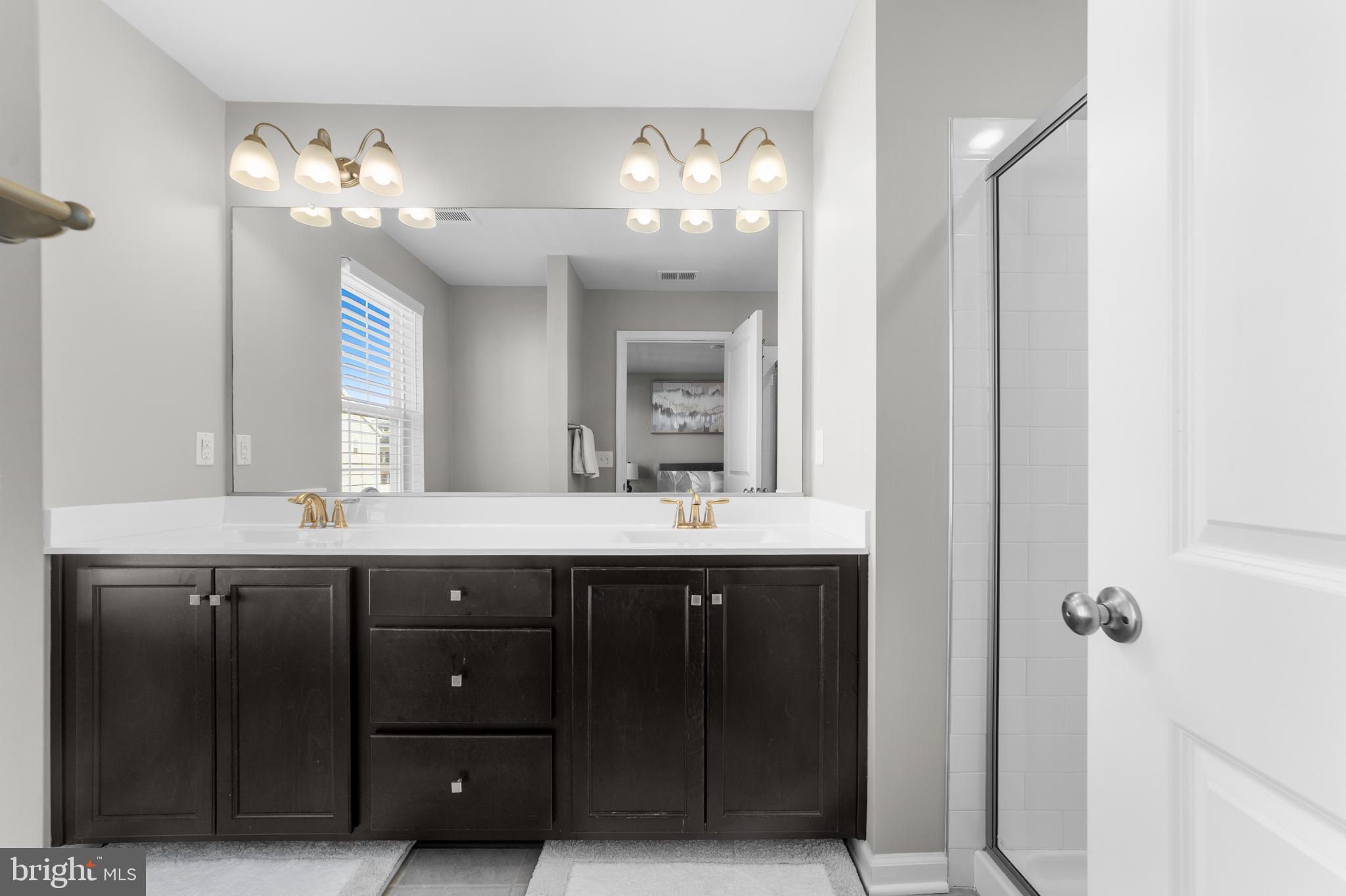 51 Turin Way Mount Laurel, NJ 08054 - Photo 20 of 35 a bathroom with a sink and a mirror