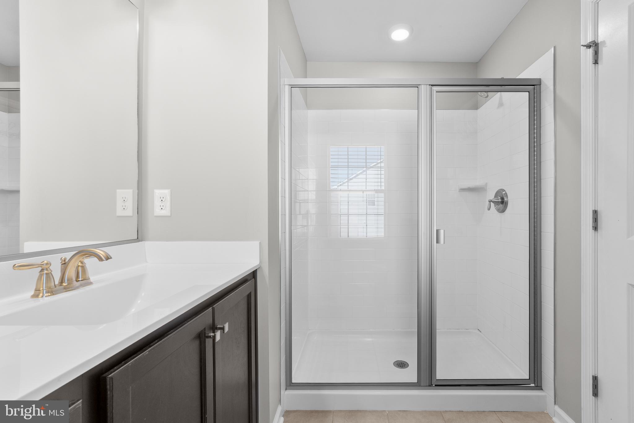 51 Turin Way Mount Laurel, NJ 08054 - Photo 21 of 35 a bathroom with a sink and a mirror