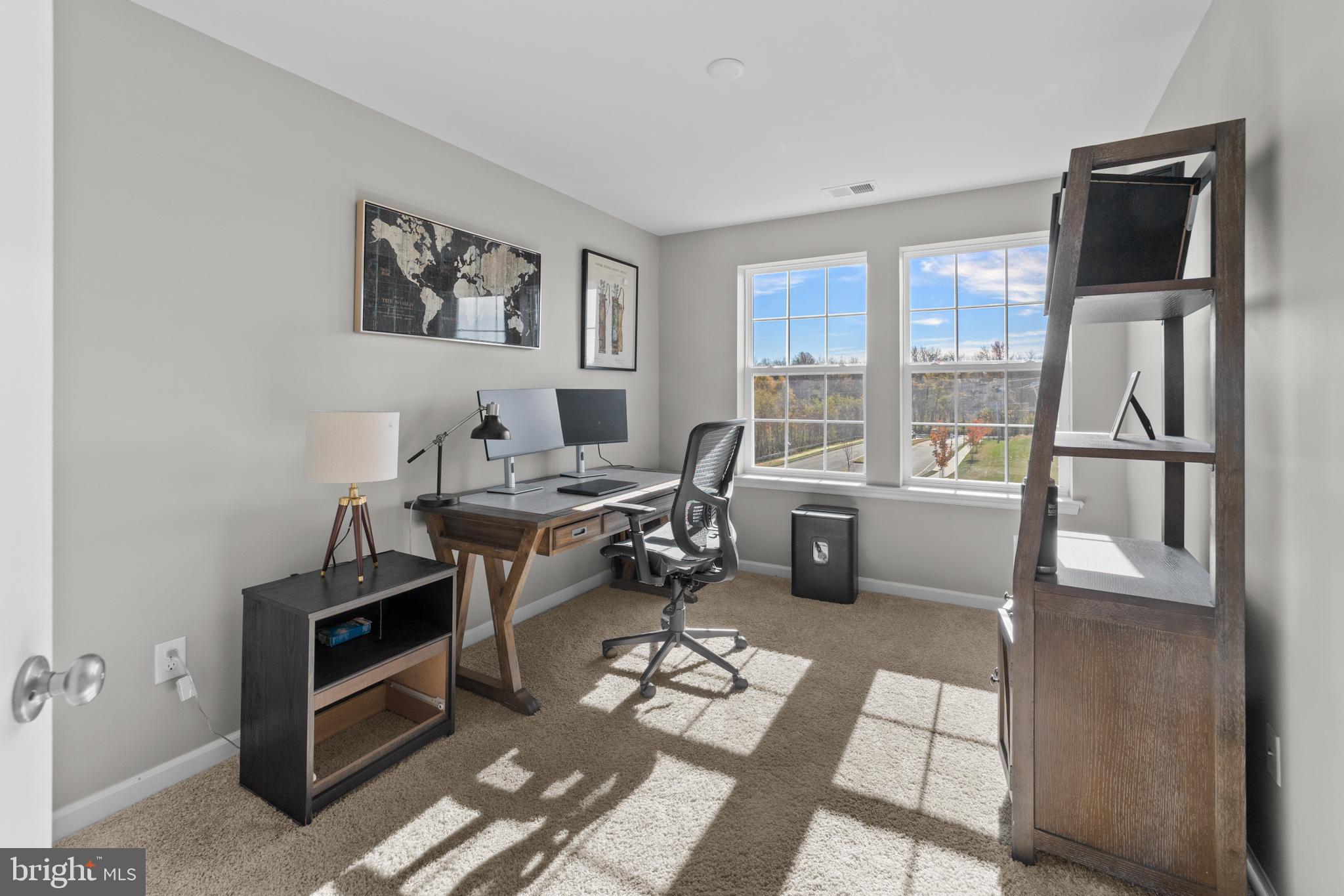 51 Turin Way Mount Laurel, NJ 08054 - Photo 26 of 35 a living room with furniture a window and a table