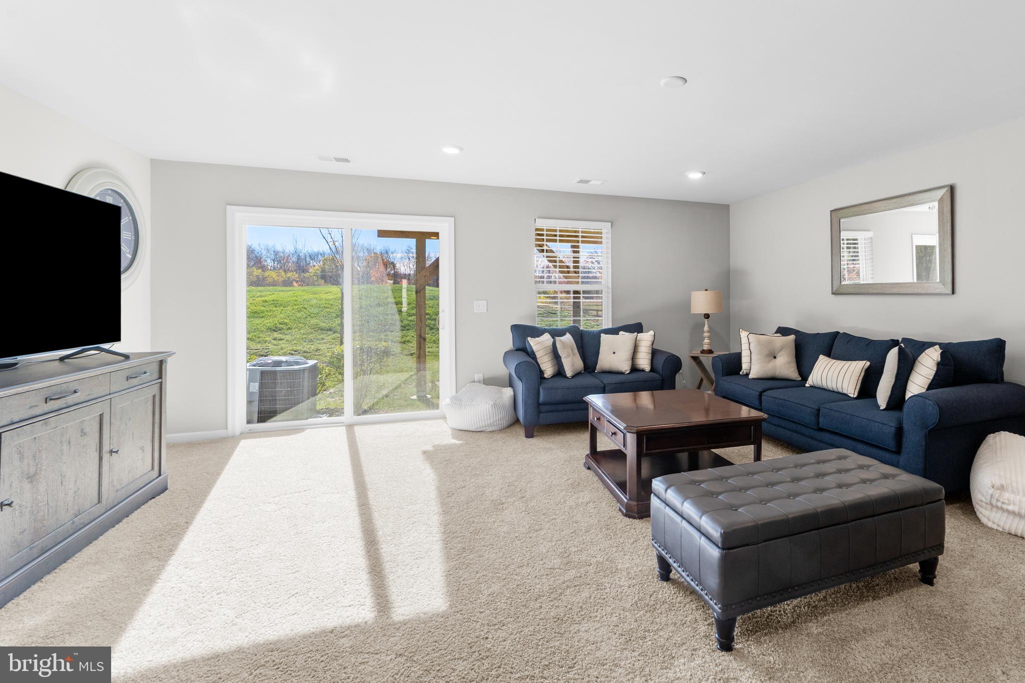 51 Turin Way Mount Laurel, NJ 08054 - Photo 3 of 35 a living room with furniture and a flat screen tv
