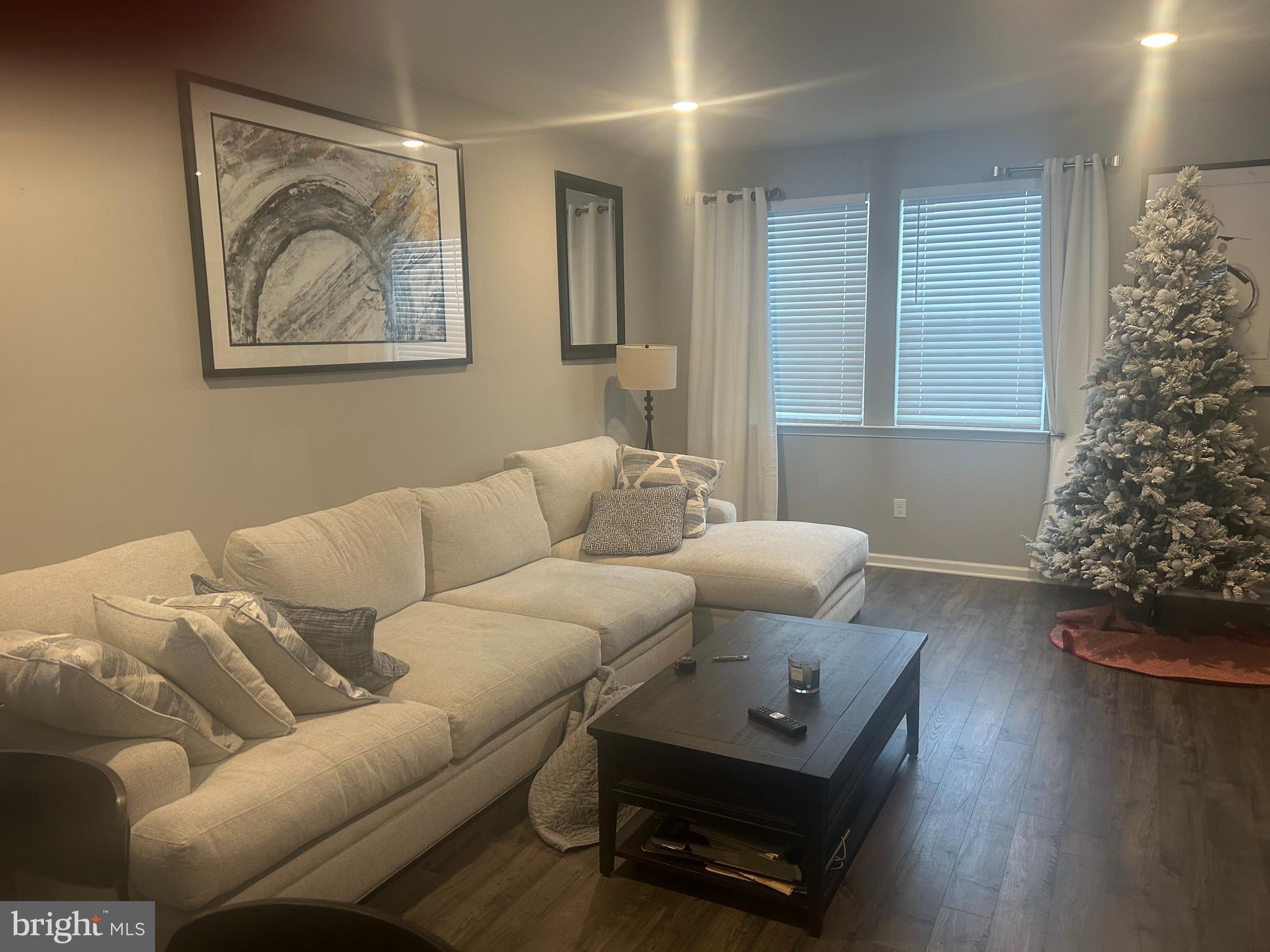 51 Turin Way Mount Laurel, NJ 08054 - Photo 33 of 35 a living room with furniture and a wooden floor