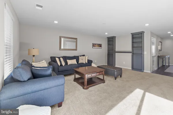 a living room with furniture and a couch