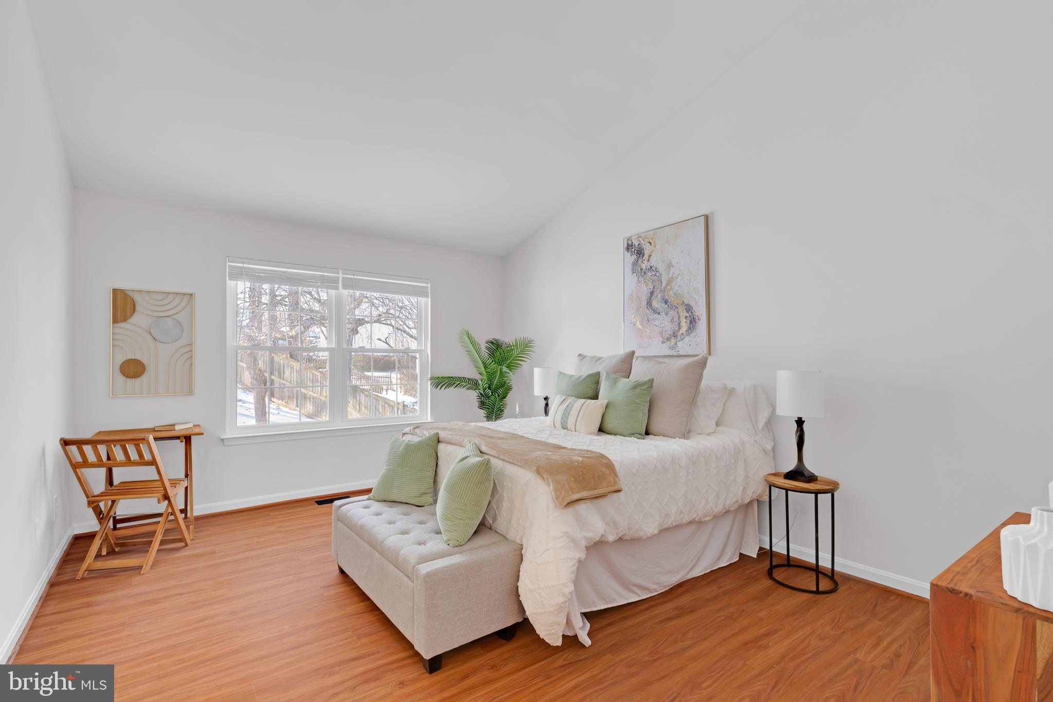 9005 Triple Ridge Road Fairfax Station, VA 22039 - Photo 17 of 38 a spacious bedroom with a bed and a couch