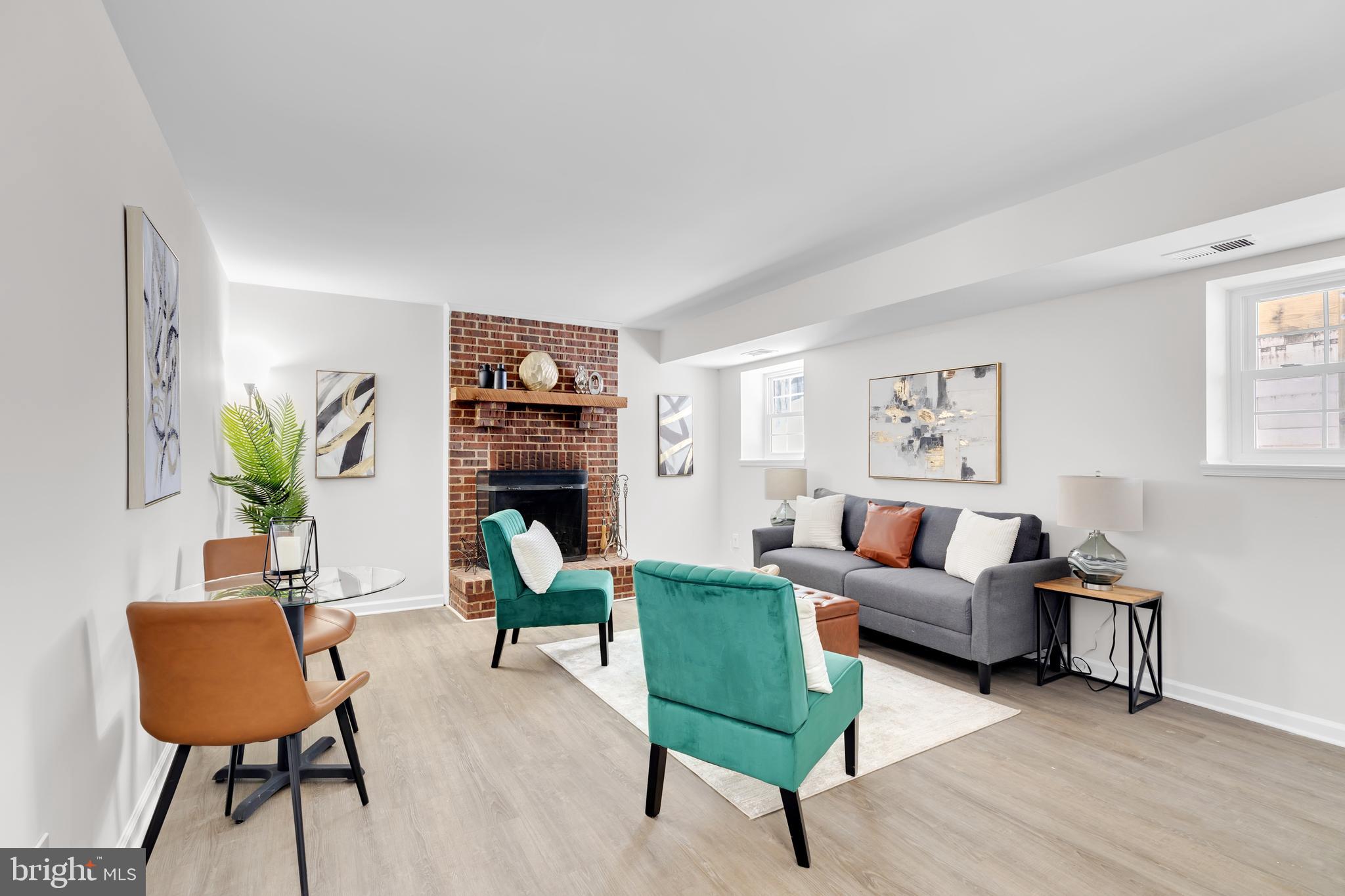 9005 Triple Ridge Road Fairfax Station, VA 22039 - Photo 28 of 38 a living room with furniture and a wooden floor