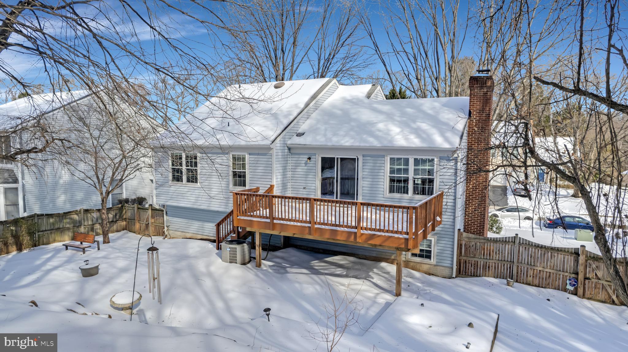 9005 Triple Ridge Road Fairfax Station, VA 22039 - Photo 33 of 38 a backyard of a house with outdoor seating