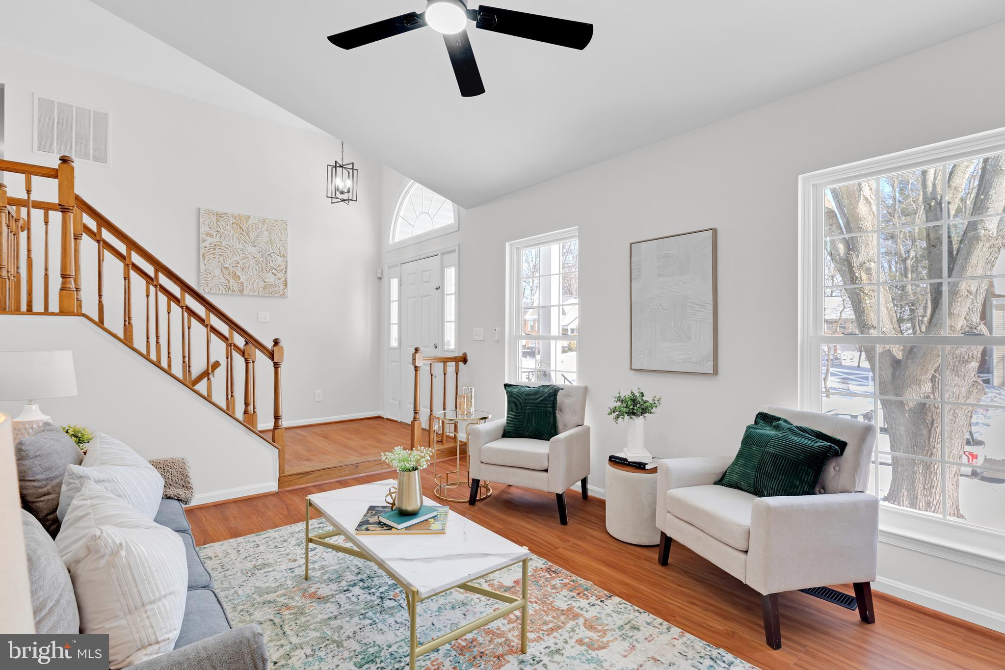 9005 Triple Ridge Road Fairfax Station, VA 22039 - Photo 6 of 38 a living room with furniture and a large window