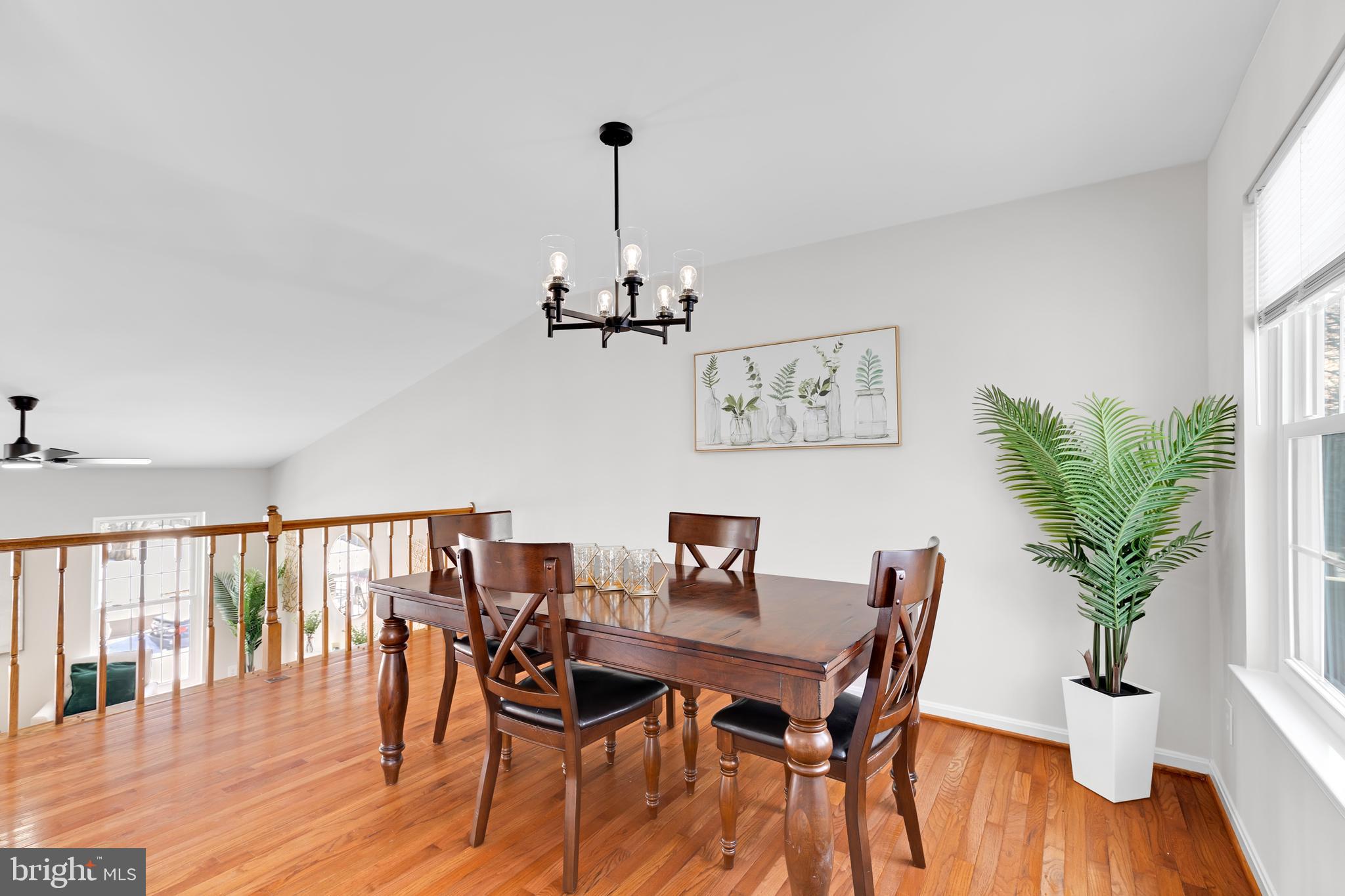 9005 Triple Ridge Road Fairfax Station, VA 22039 - Photo 10 of 38 a view of a dining room with furniture window and wooden floor
