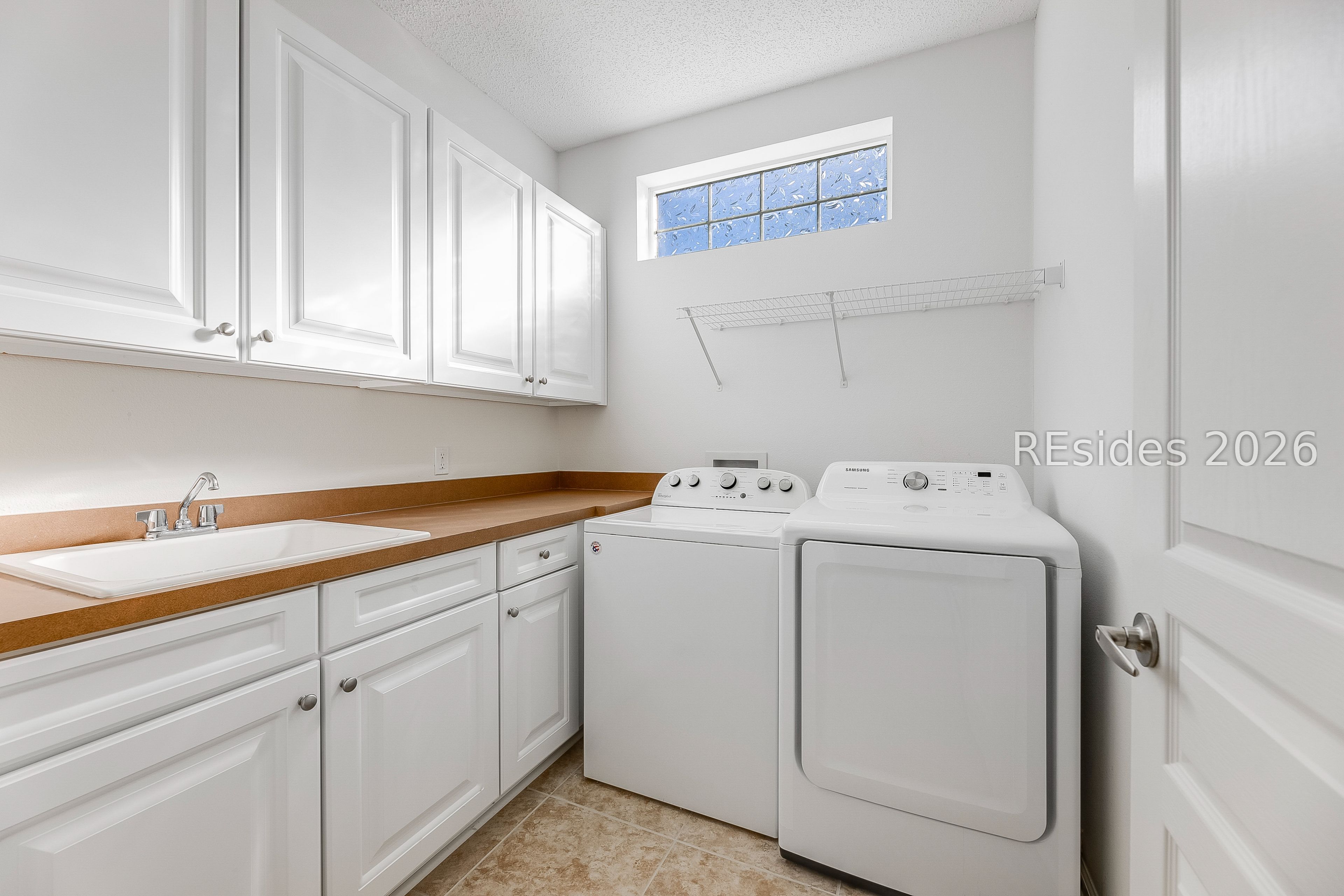 108 Landing Lane Bluffton, SC 29909 - Photo 26 of 52 Large and bright laundry room with a sink