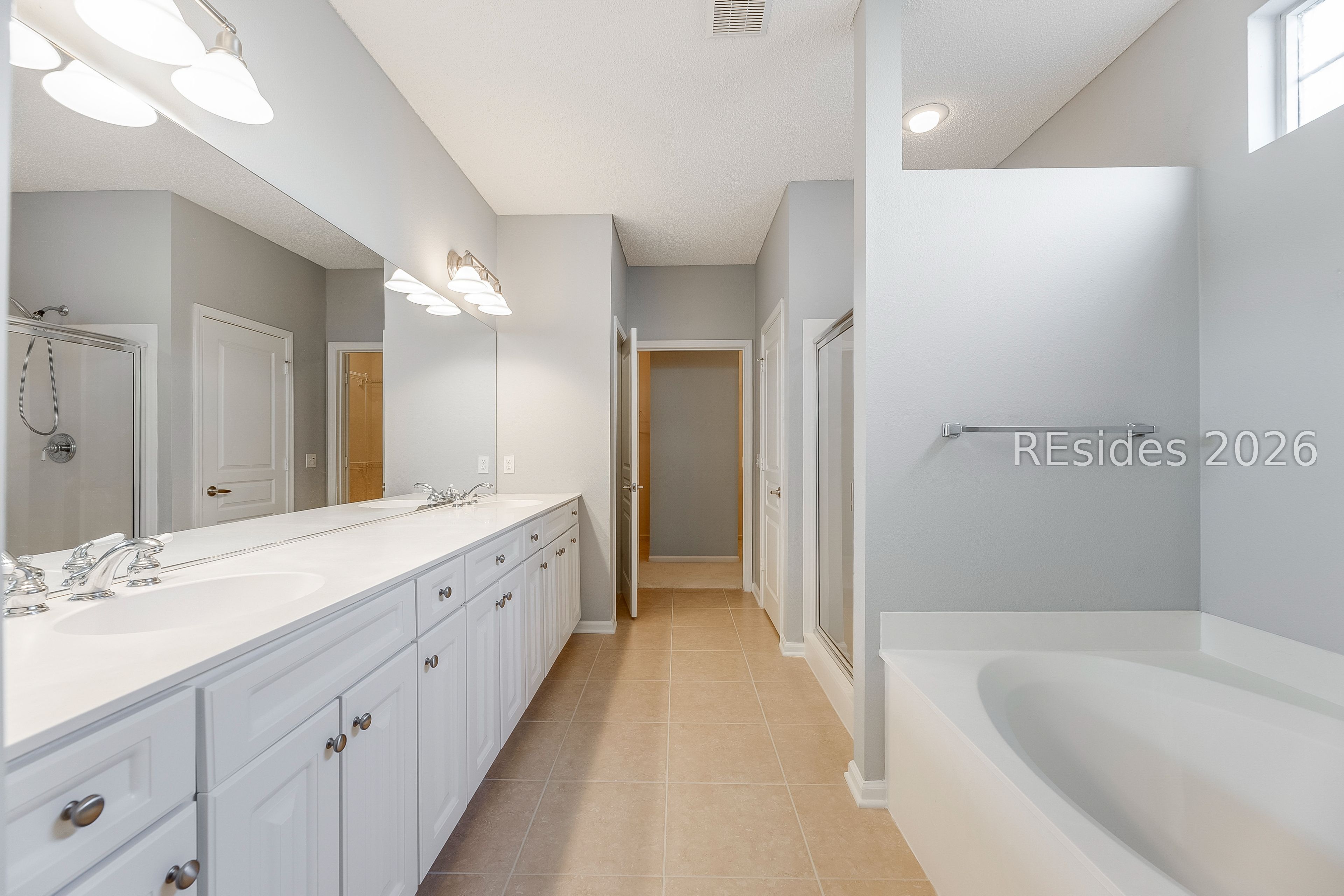 108 Landing Lane Bluffton, SC 29909 - Photo 34 of 52 Primary bath with soaking tub and walk in shower