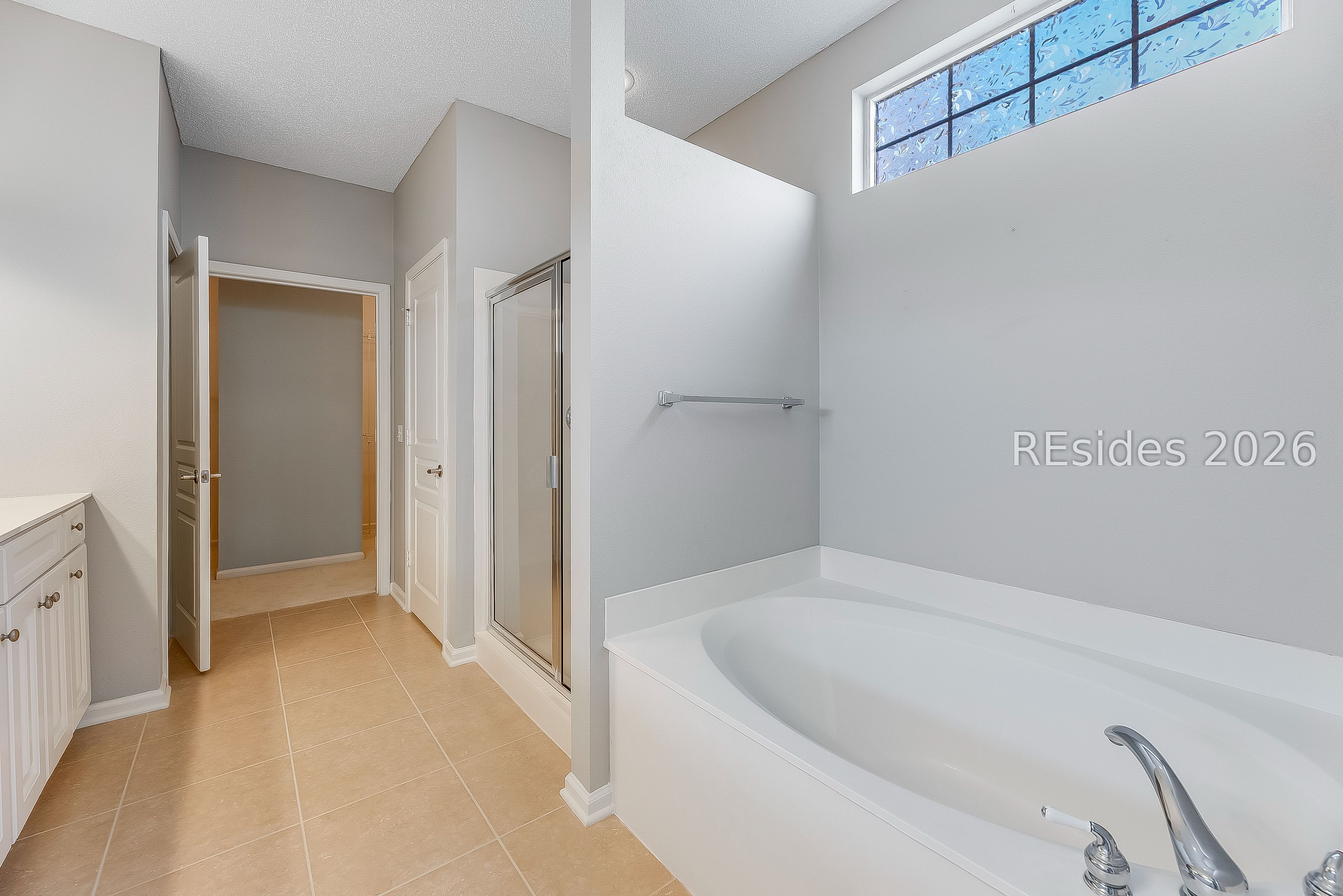 108 Landing Lane Bluffton, SC 29909 - Photo 35 of 52 Primary bath with soaking tub and walk in shower