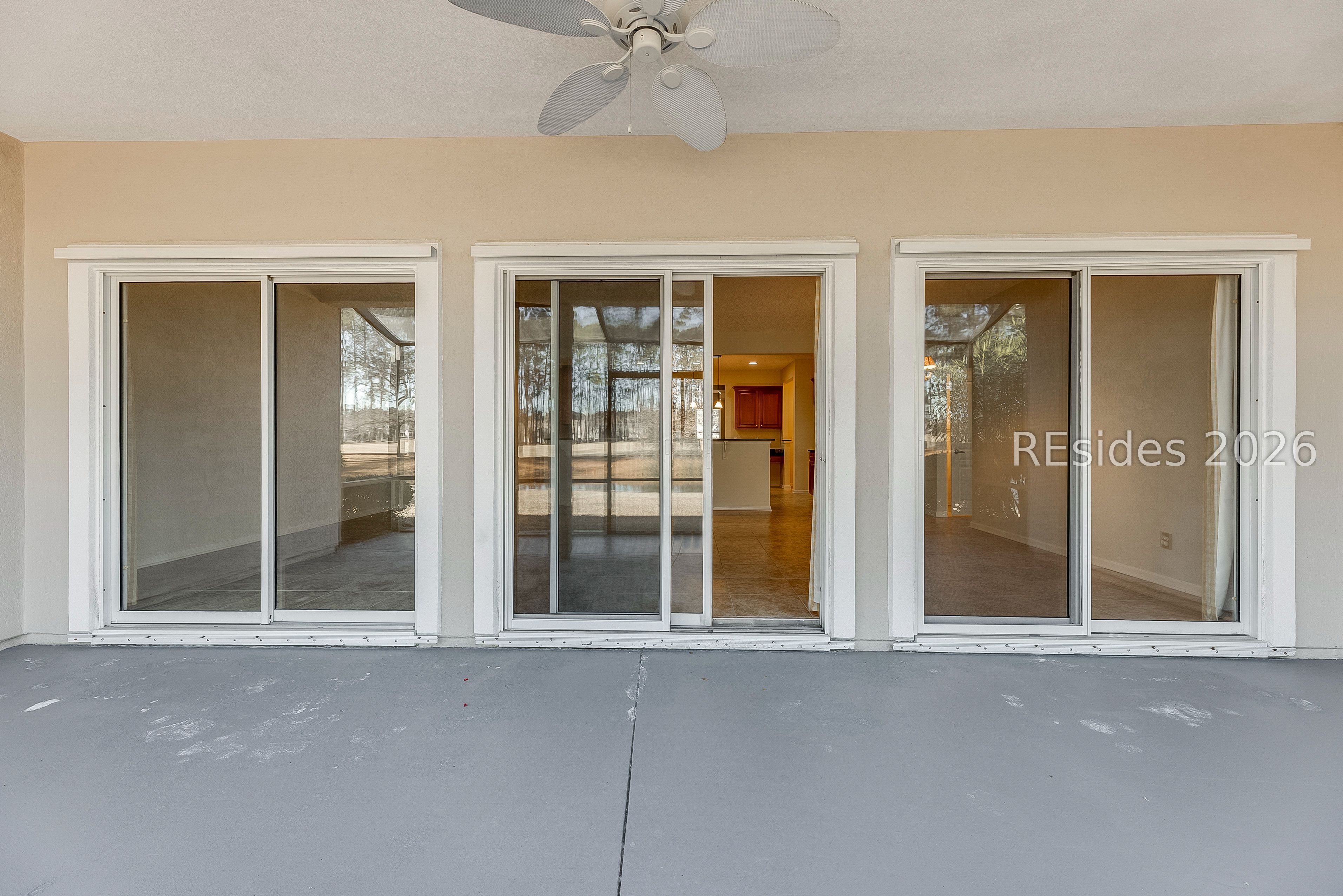 108 Landing Lane Bluffton, SC 29909 - Photo 10 of 52 Three large sliding doors from the lanai
