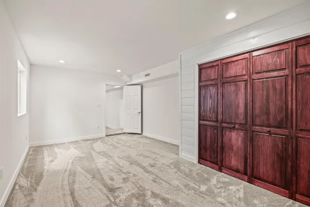 a car parked in front of garage