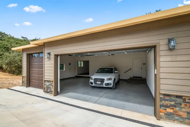 a view of a livingroom with white walls and white walls