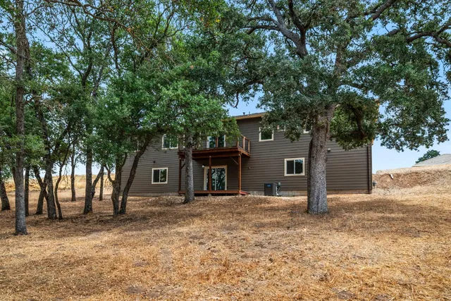 a view of a yard with an outdoor space