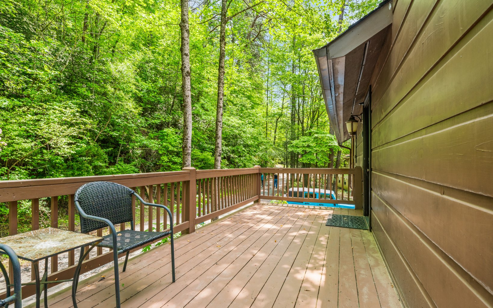 285 Shallowford Bridge Lane Blue Ridge, GA 30513 - Photo 65 of 66 a view of balcony with wooden floor and outdoor seating