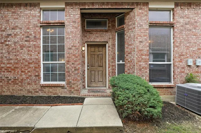 a front view of a house having yard