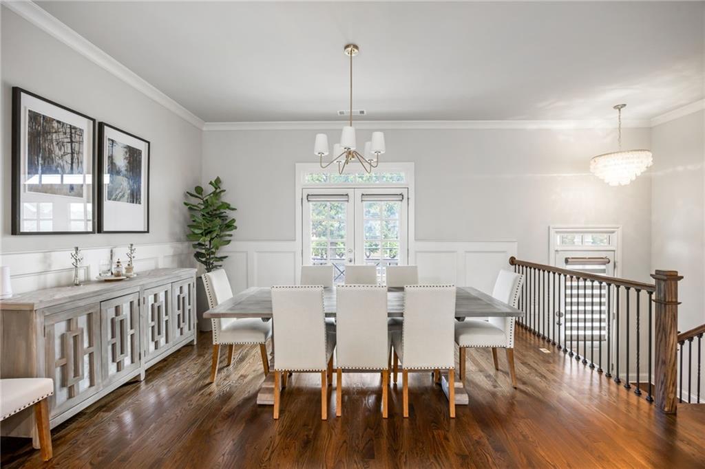 1799 Falling Sky Court Atlanta, GA 30319 - Photo 3 of 26 a view of a dining room with furniture window and wooden floor