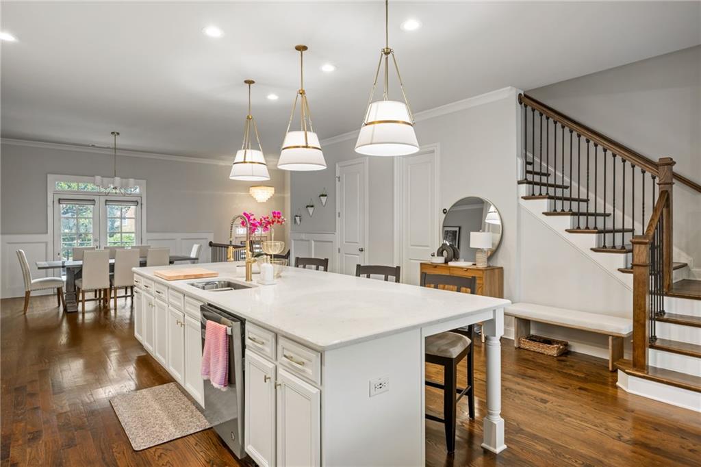 1799 Falling Sky Court Atlanta, GA 30319 - Photo 5 of 26 a large kitchen with a table and chairs