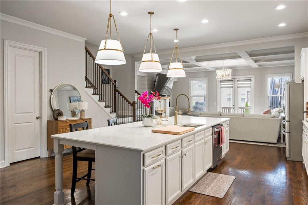 1799 Falling Sky Court Atlanta, GA 30319 - Photo 6 of 26 a large kitchen with a table and chairs