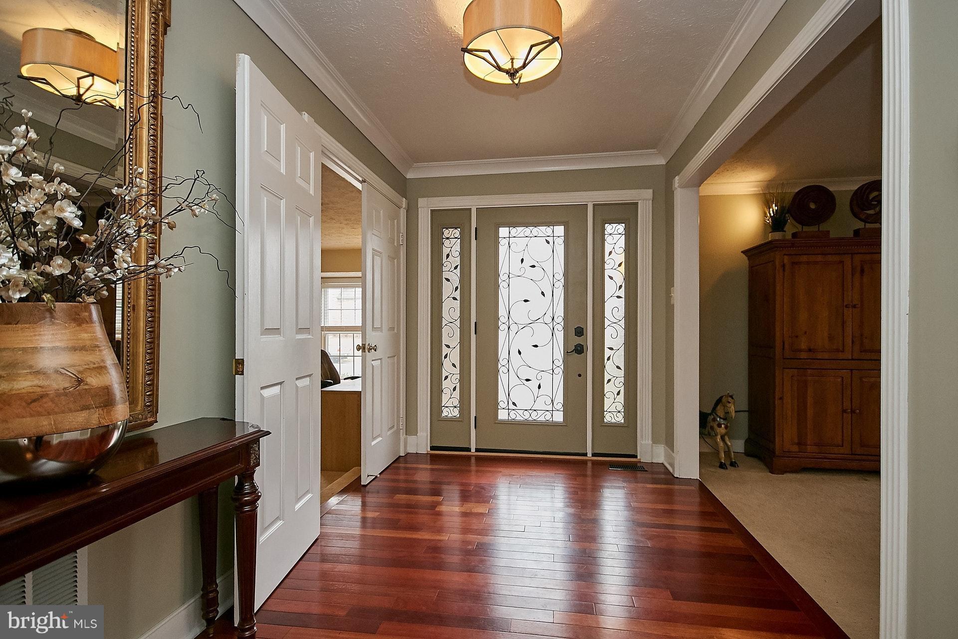 5504 Ashleigh Road Fairfax, VA 22030 - Photo 5 of 30 Welcoming Foyer - Gleaming Brazilian Cherry Wood