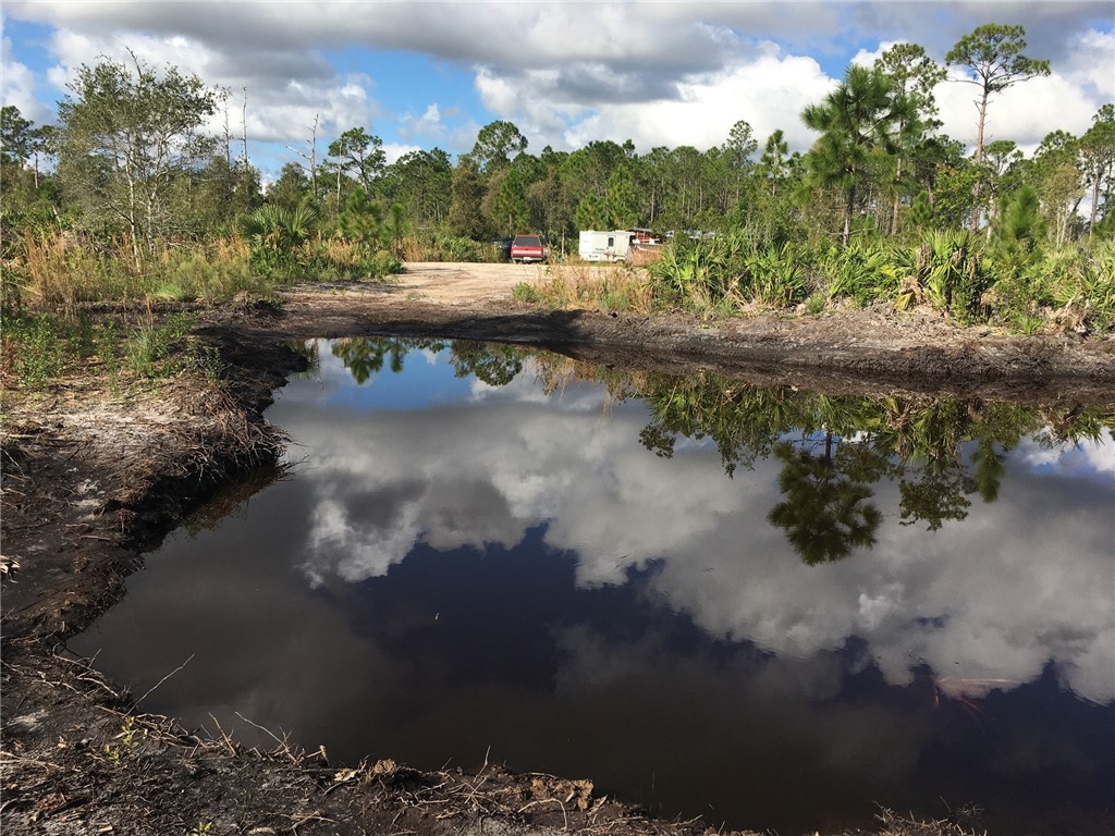 0 Beekeeper Road Malabar, FL 32950 - Photo 8 of 20 a view of a lake with large trees