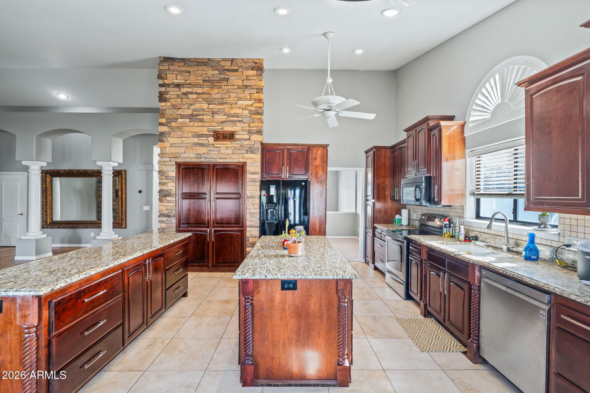 1038 South 38th Street Mesa, AZ 85206 - Photo 23 of 59 a large kitchen with kitchen island granite countertop lots of counter top space