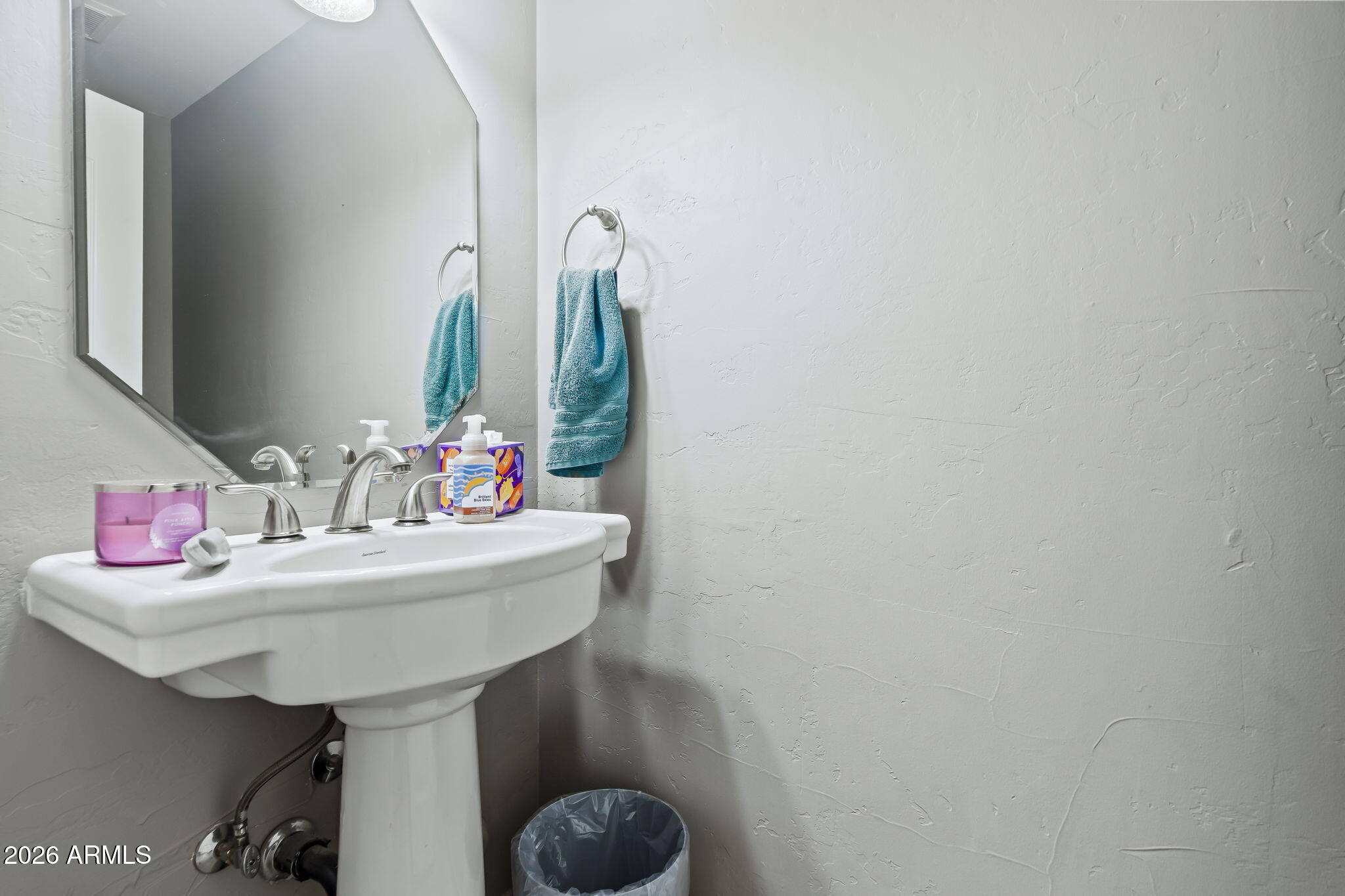 1038 South 38th Street Mesa, AZ 85206 - Photo 25 of 59 a bathroom with a sink and a mirror