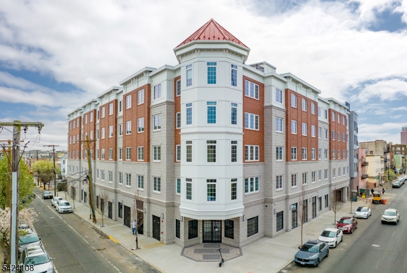 558 Market Street Newark, NJ 07105 - Photo 1 of 17 a front view of a building with street view