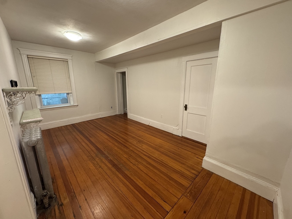 31 Westbourne Terrace, Unit 2 Brookline, MA 02446 - Photo 10 of 15 a view of empty room with wooden floor