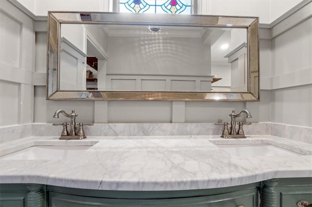 5143 Floyd Street Northeast Covington, GA 30014 - Photo 17 of 27 a kitchen with a sink and cabinets