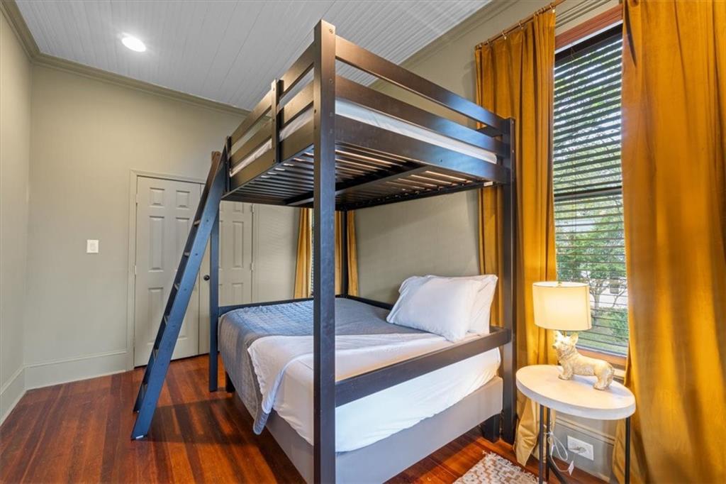 5143 Floyd Street Northeast Covington, GA 30014 - Photo 20 of 27 a bedroom with a bed and a table