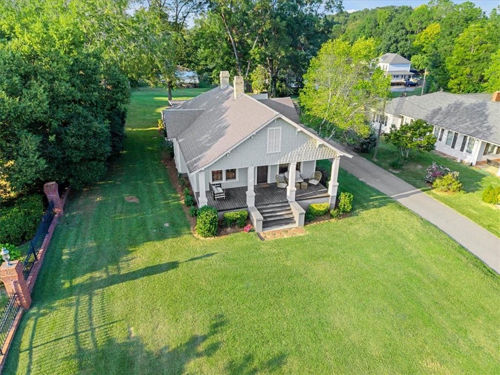 5143 Floyd Street Northeast Covington, GA 30014 - Photo 23 of 27 a aerial view of a house with a yard table and chairs