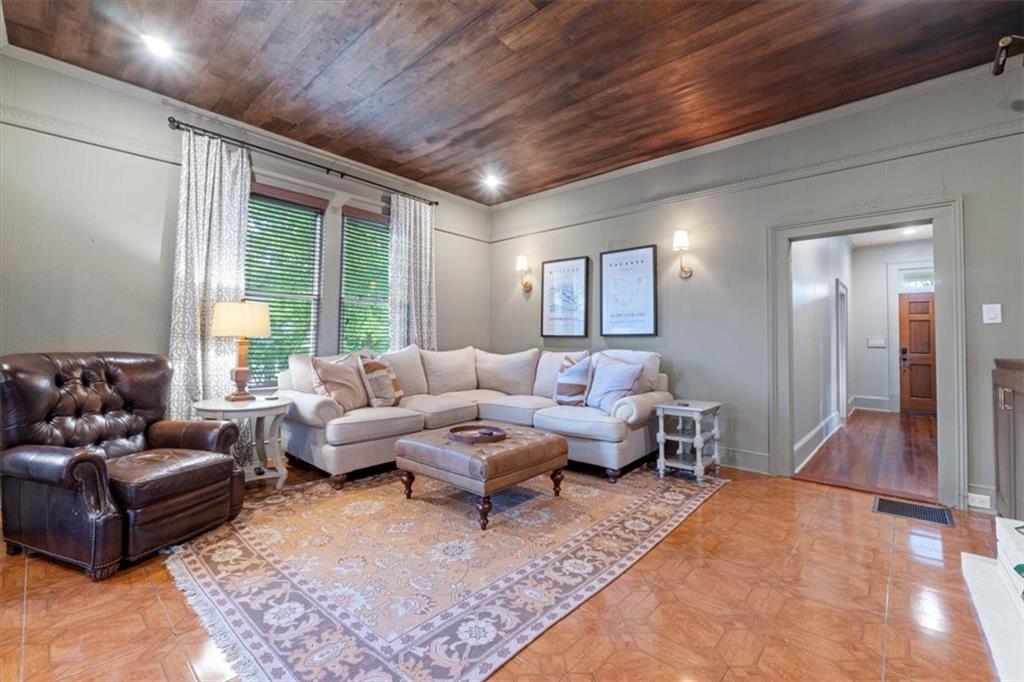 5143 Floyd Street Northeast Covington, GA 30014 - Photo 9 of 27 a living room with furniture and a large window