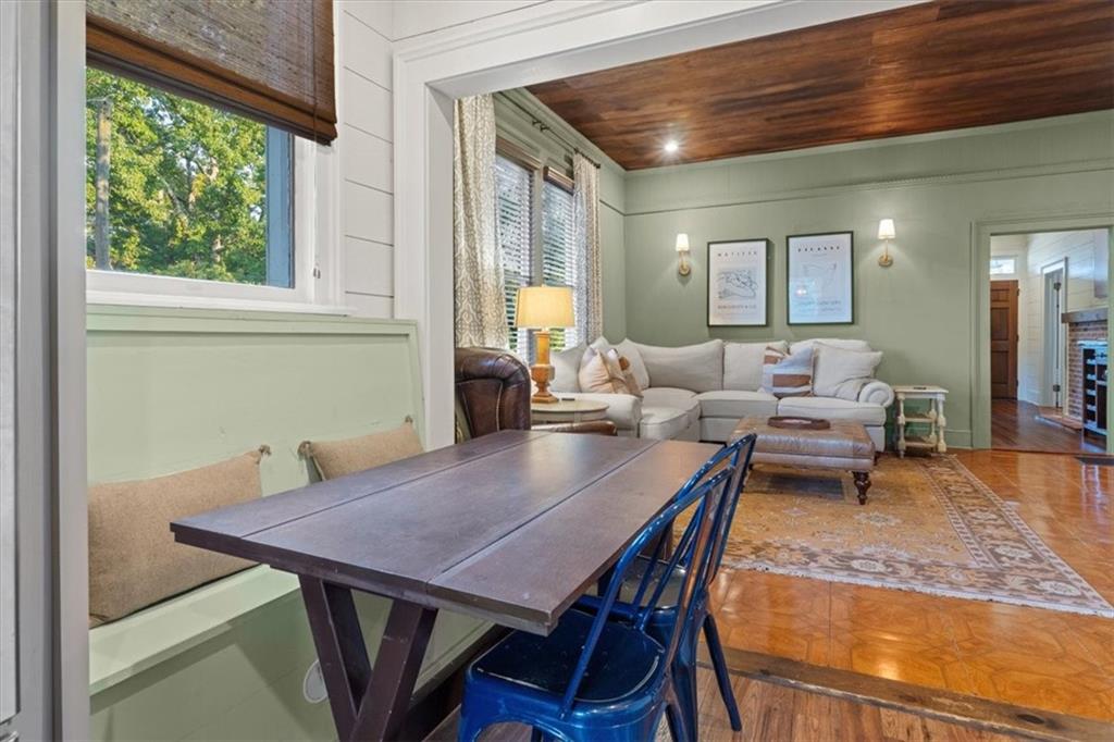 5143 Floyd Street Northeast Covington, GA 30014 - Photo 10 of 27 a view of a dining room with furniture window and wooden floor