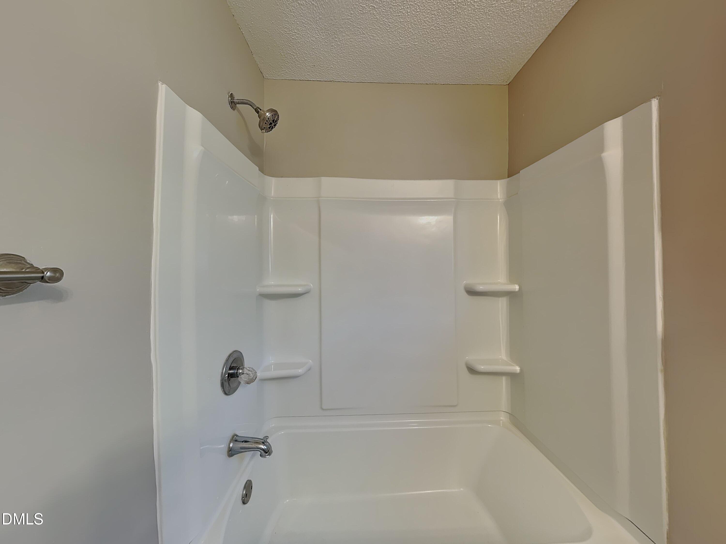 3520 Lytham Place Raleigh, NC 27604 - Photo 13 of 18 a close view of a bathtub in a bathroom