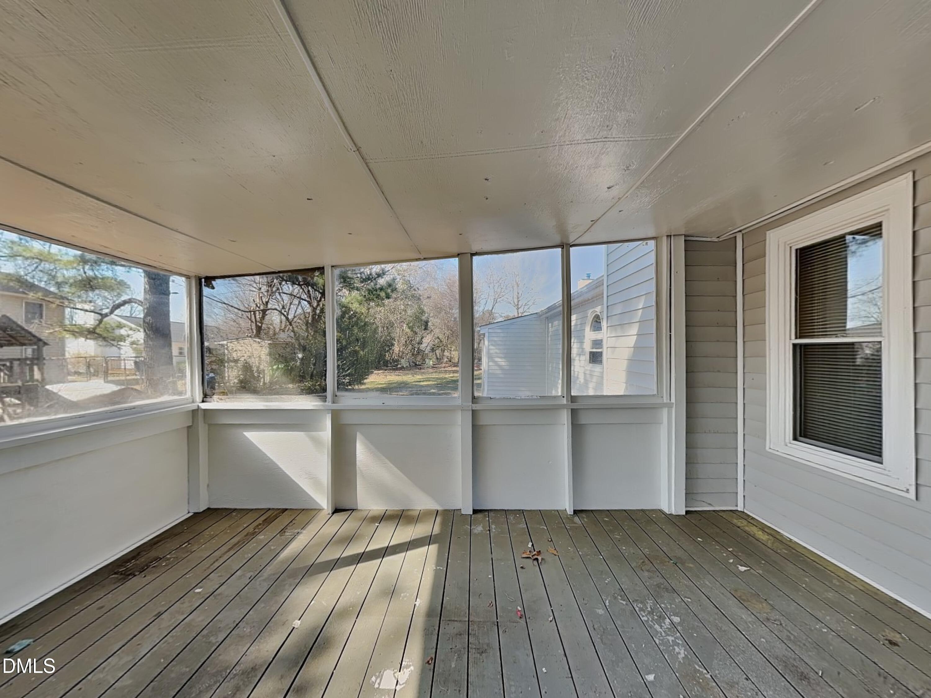 3520 Lytham Place Raleigh, NC 27604 - Photo 15 of 18 an empty room with wooden floor and windows