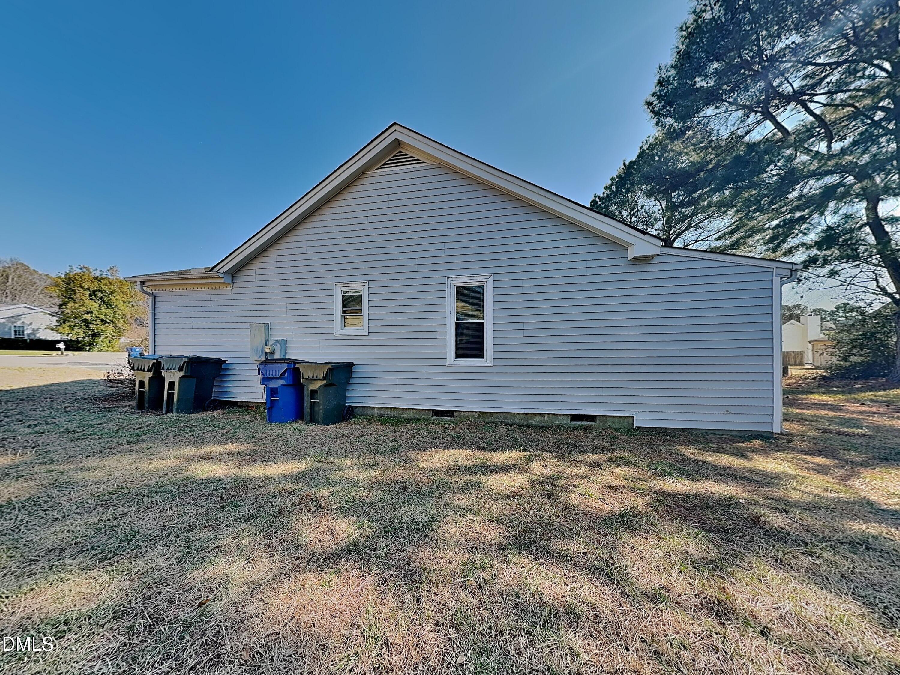 3520 Lytham Place Raleigh, NC 27604 - Photo 17 of 18 a view of a house with a yard