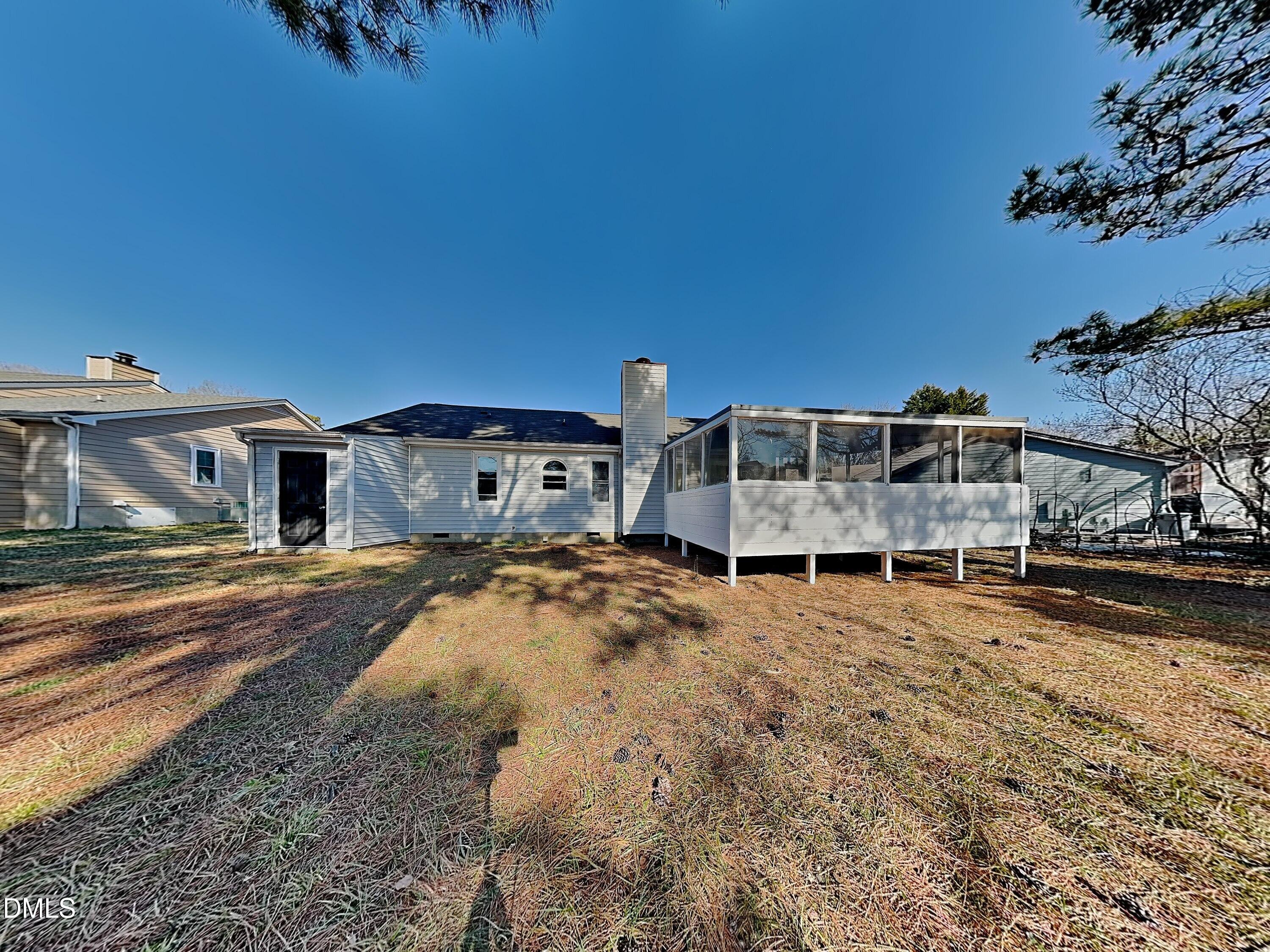 3520 Lytham Place Raleigh, NC 27604 - Photo 18 of 18 a house with a yard