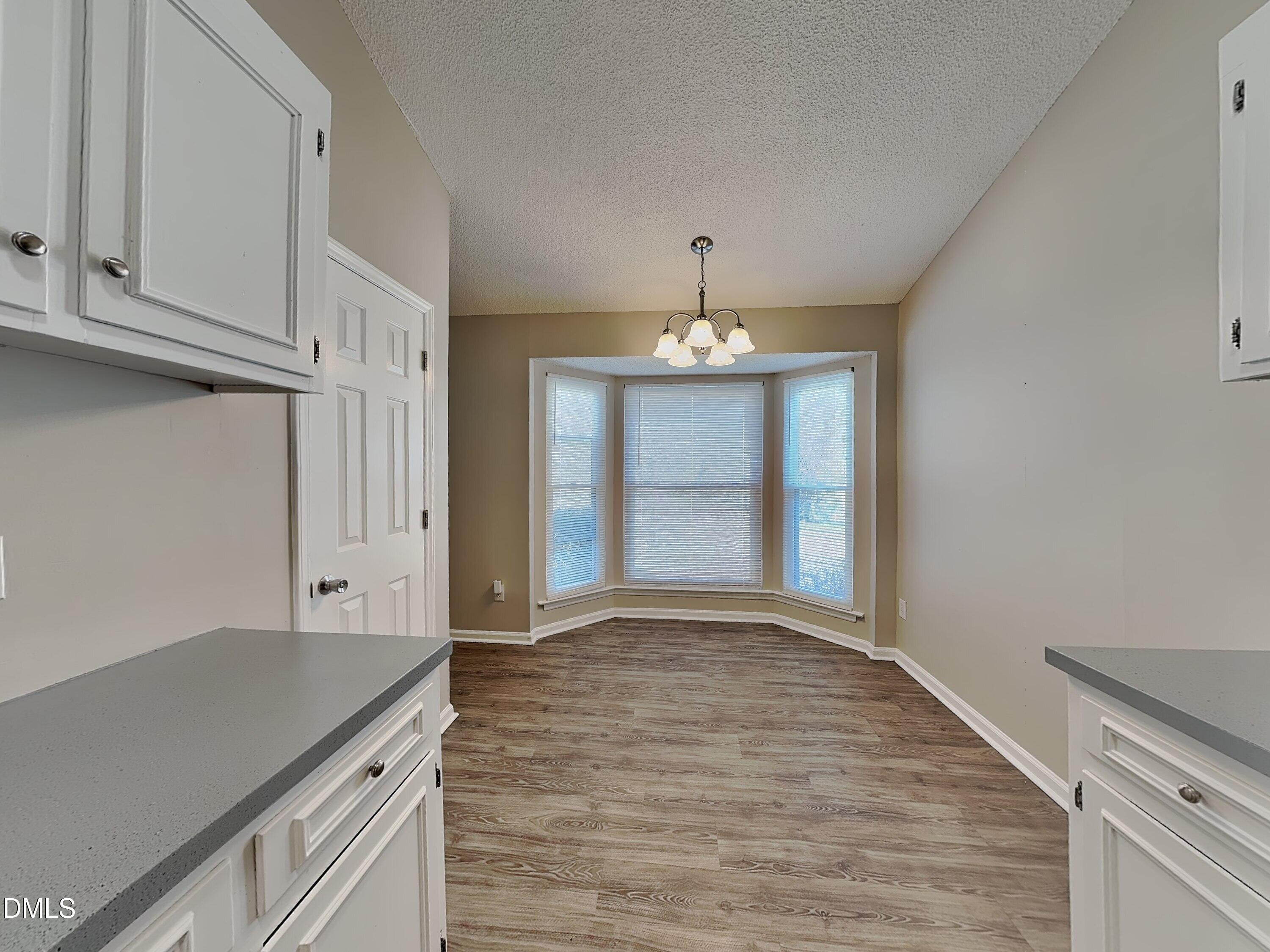3520 Lytham Place Raleigh, NC 27604 - Photo 5 of 18 a view of a kitchen with marble kitchen and sink