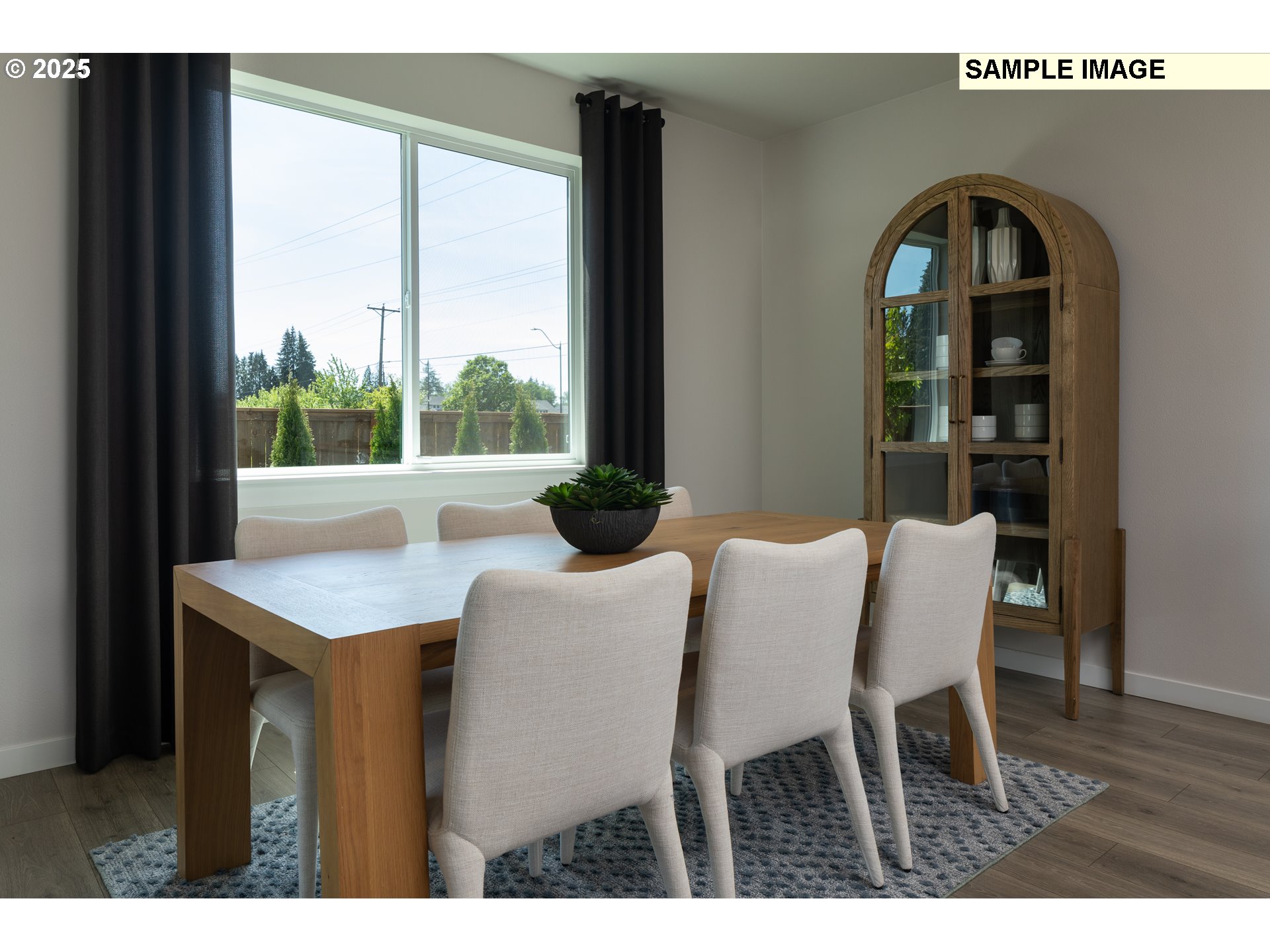 3201 Southwest 4th Avenue Battle Ground, WA 98604 - Photo 7 of 18 a dining room with a table and chairs