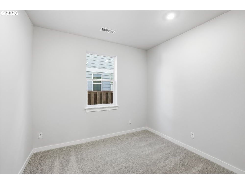 3201 Southwest 4th Avenue Battle Ground, WA 98604 - Photo 10 of 18 a view of an empty room with a window